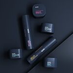 Alle Produkte der STYLE EFFECT Serie von GLYNT liegen auf dunkelblauem Untergrund