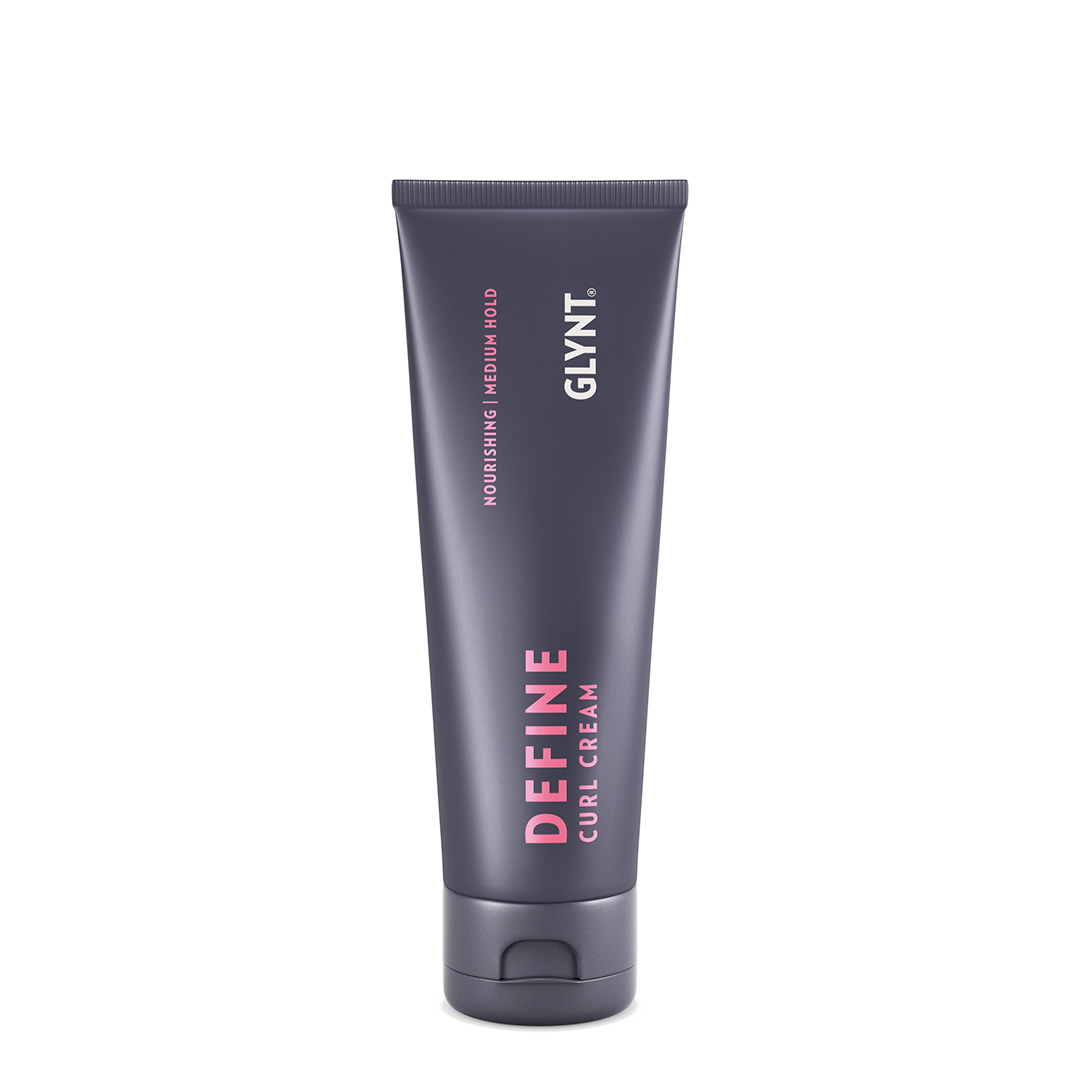 Lockencreme DEFINE Curl Cream von GLYNT in einer dunkel-violetten 125-ml-Tube mit pinker Schrift